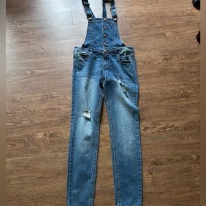 Skinny overall pants.